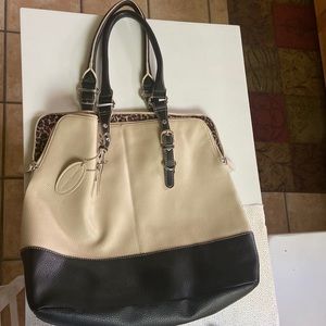 Wilson leather Black and Tan handbag with leopard print inside lining